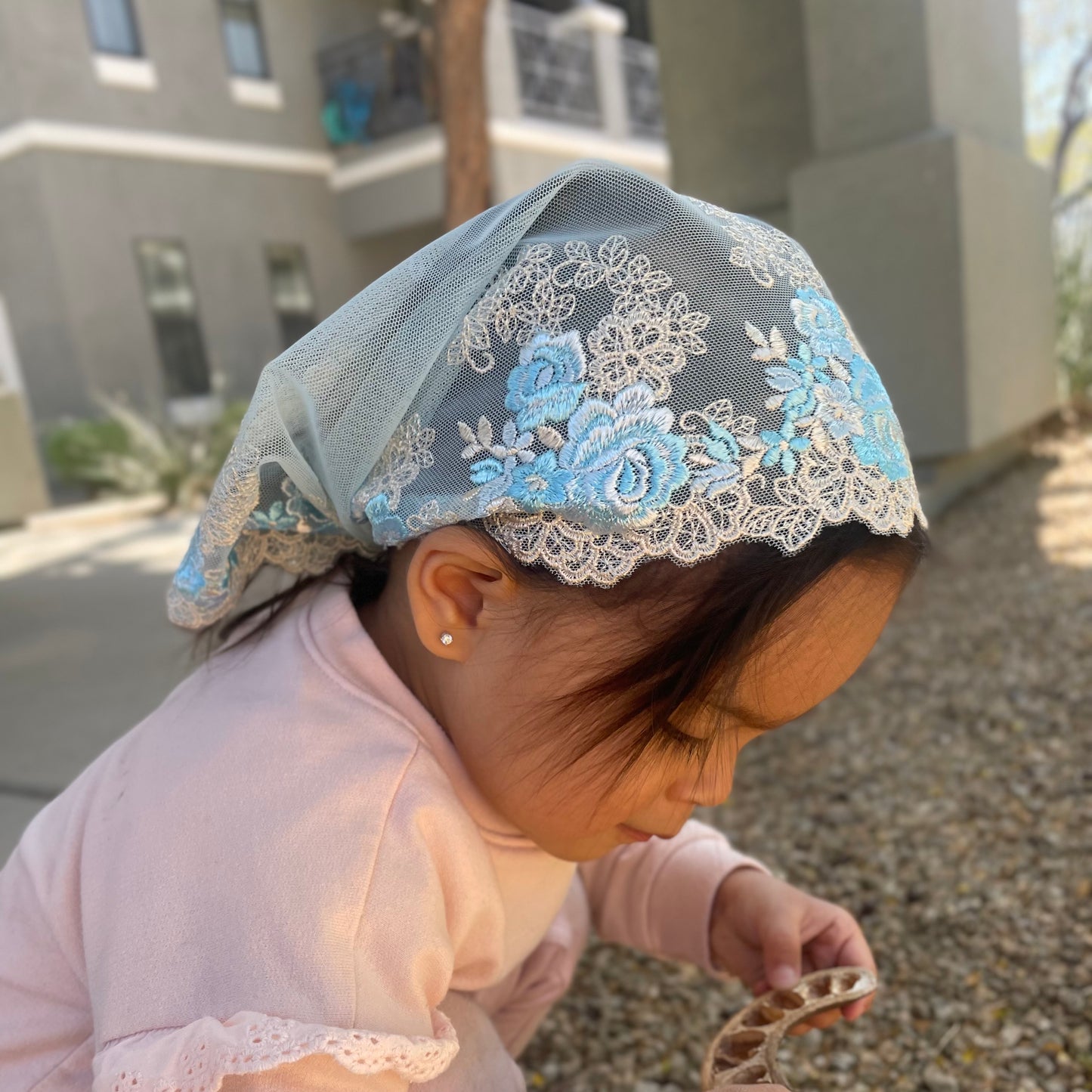 Light blue lace veil with rose embroidery. The baby or toddler mantilla is perfect for Traditional Catholic Christian Mass