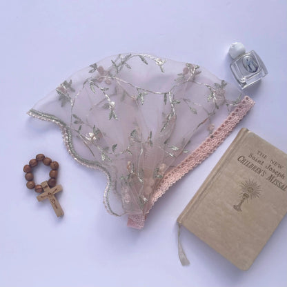 Baby lace veil with pink floral embroidery. The baby or toddler Christian mantilla is perfect for Traditional Catholic Mass