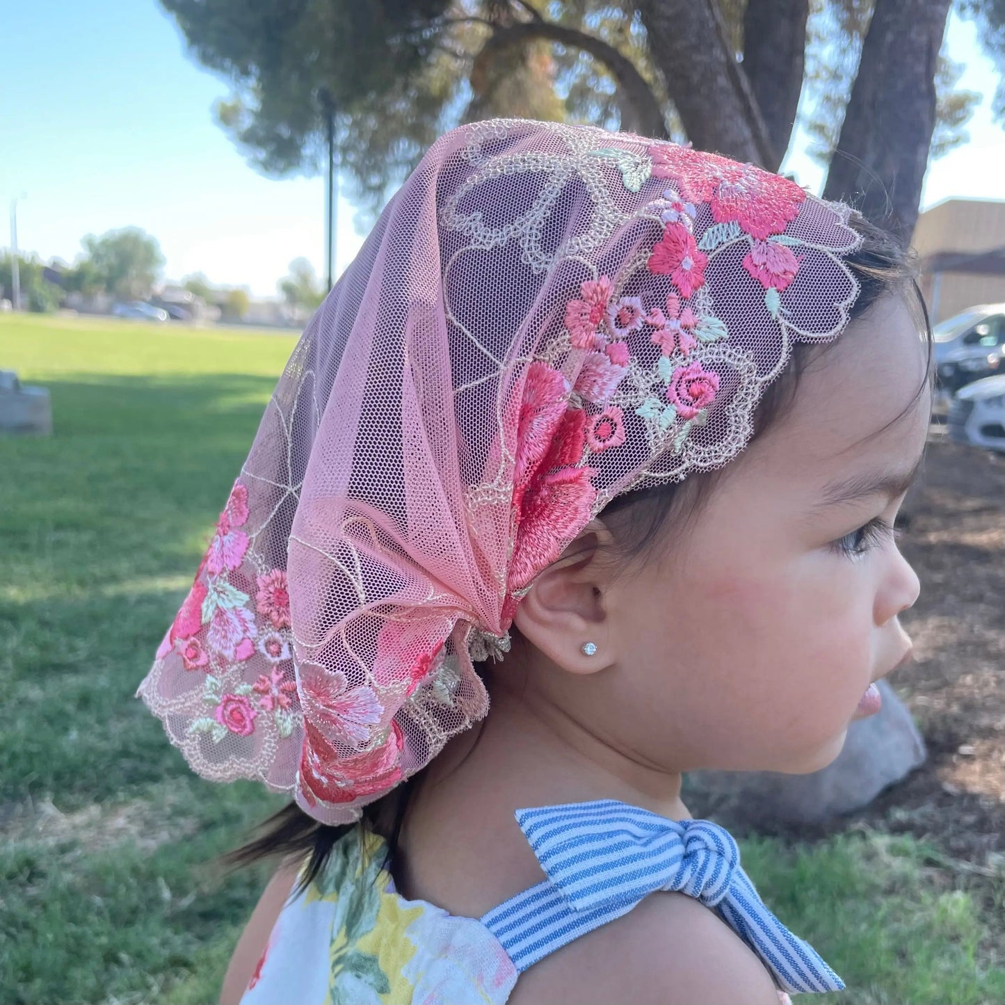 Baby headband veil with intricate floral embroidered lace, ideal for catholic mass.