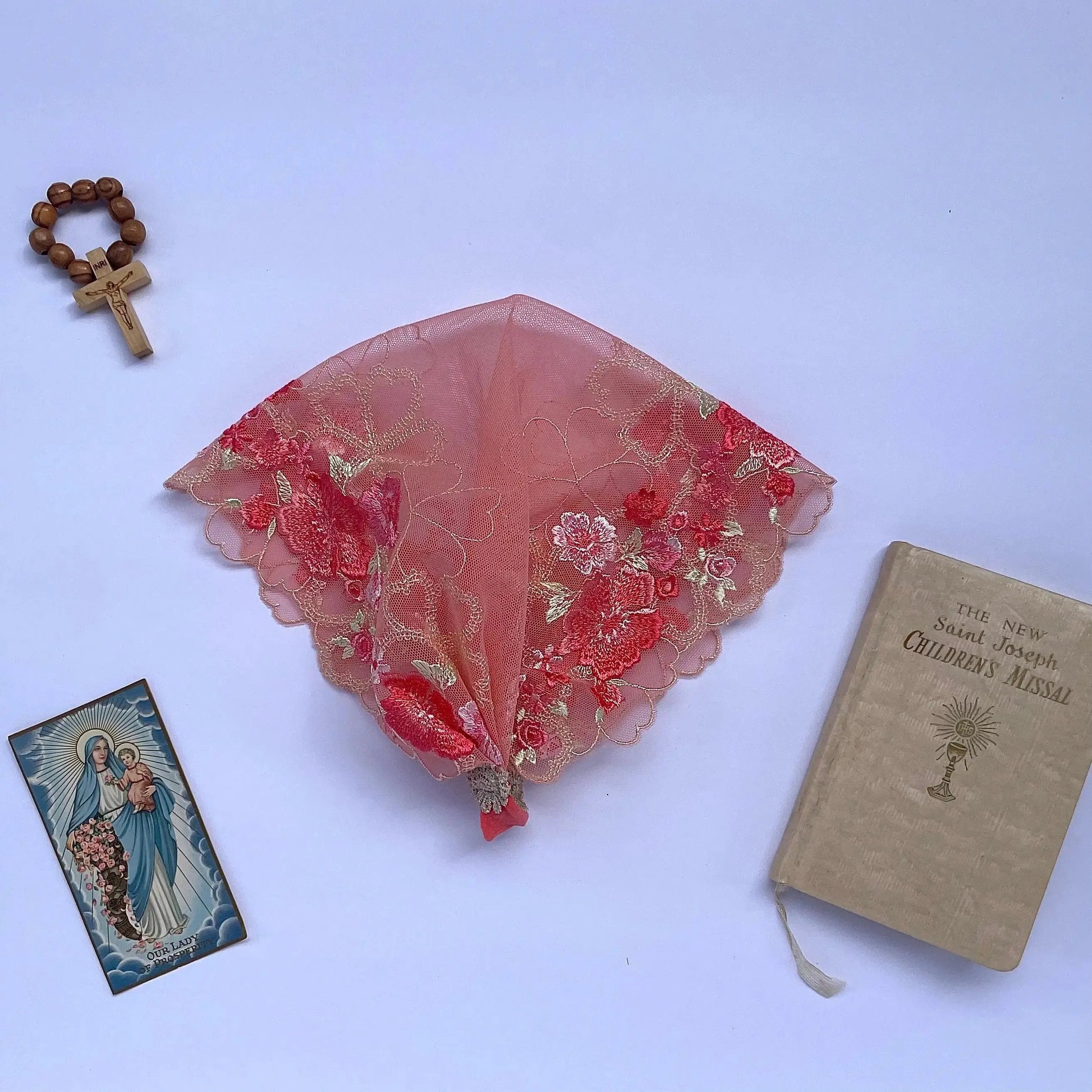 Embroidered pink floral lace newborn veil for a traditional Catholic Mass or devotion. 