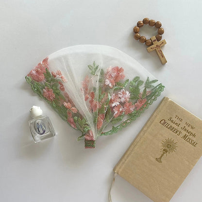 Embroidered pink and green floral lace newborn veil for traditional Catholic devotion.