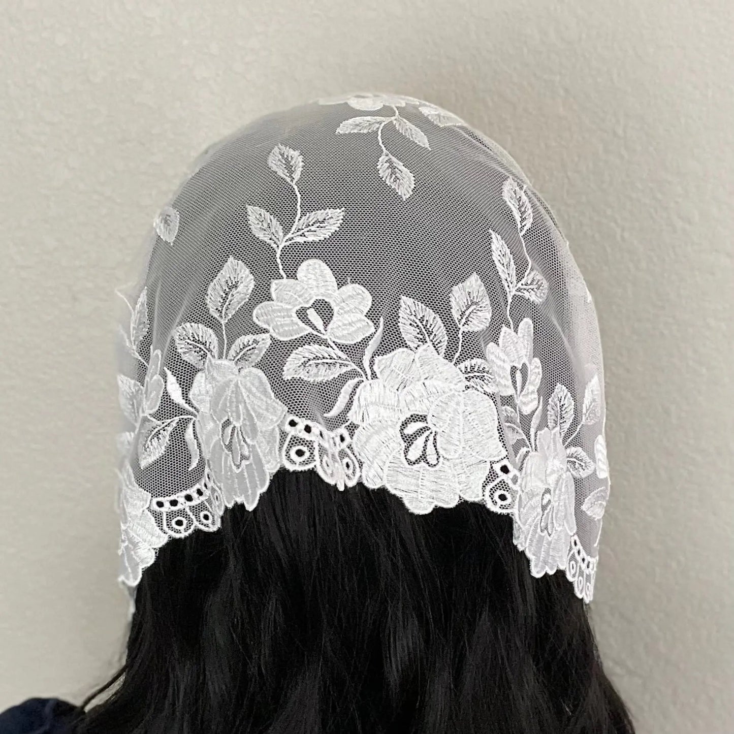 Back view of a small white colored headwrap Catholic Mass chapel veil.
