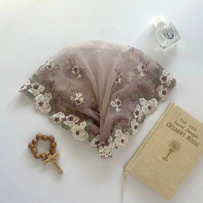 Delicate purple embroidered lace baby veil for a traditional Catholic Mass.
