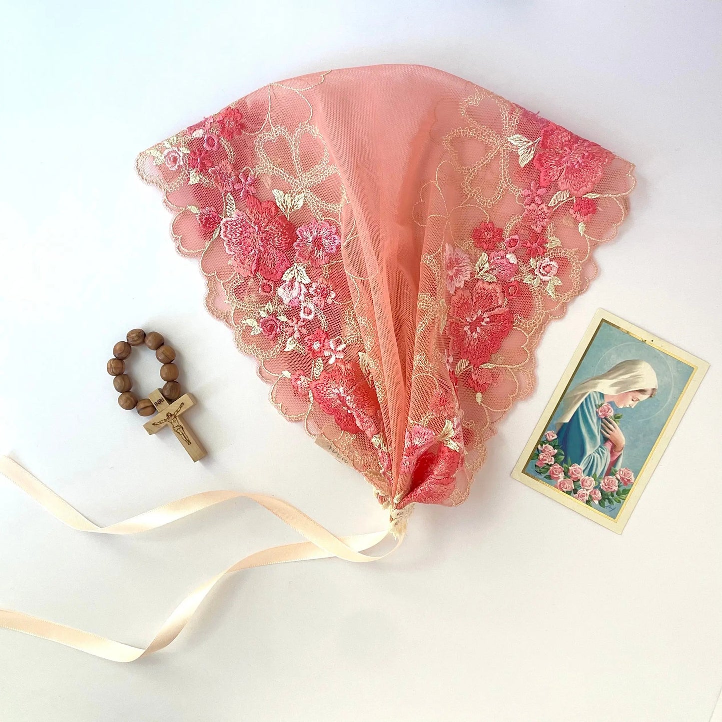 Floral embroidered lace chapel veil headwrap for a small girl's Catholic mass. 