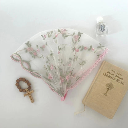 Pink embroidered lace baby headband veil for Traditional Catholic Mass.