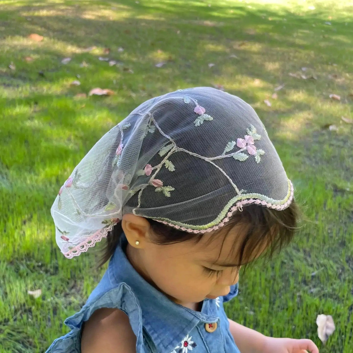 Pink embroidered floral lace traditional chapel veil for a christian toddler.