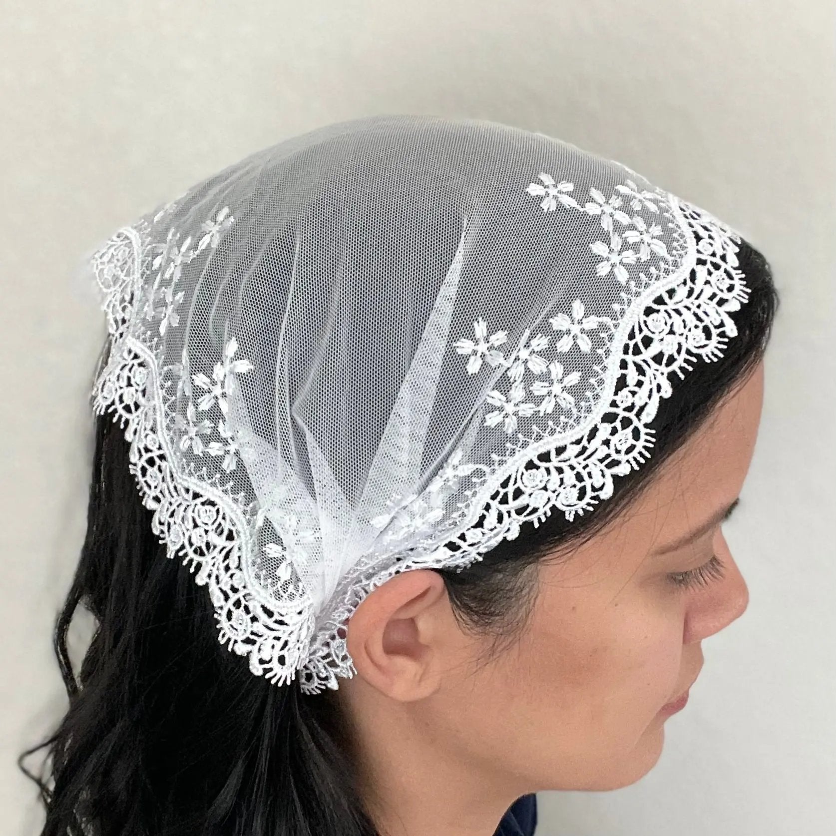 One size white lace bandana style chapel veil for a Catholic girl or woman