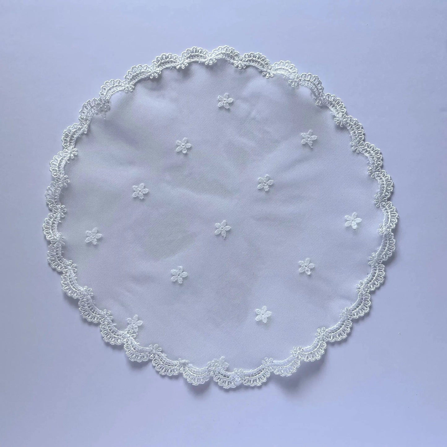 Floral embroidered White lace circular veil for girls at traditional Catholic mass or a prayer service.