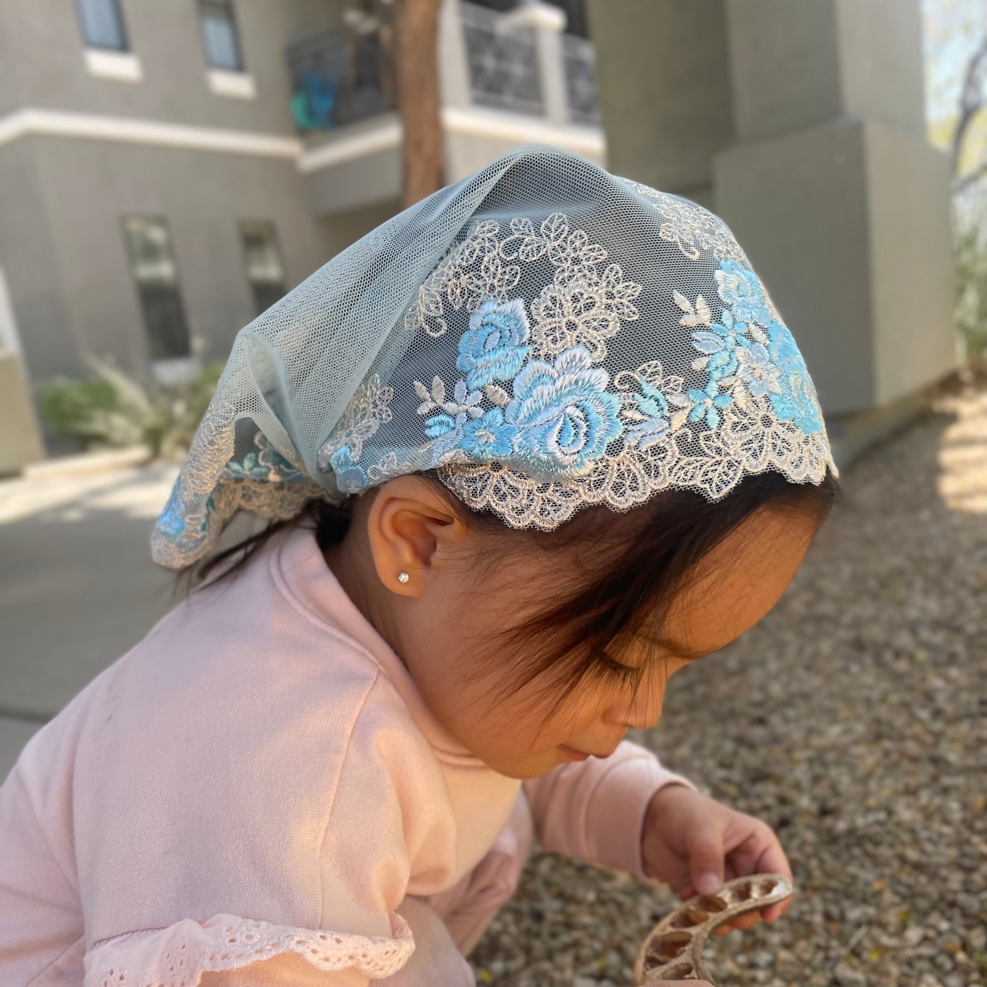 Light blue lace veil with rose embroidery. The baby or toddler mantilla is perfect for Traditional Catholic Christian Mass